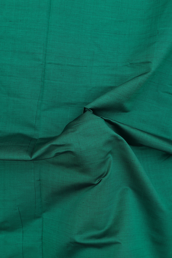 Semi Silk Cotton Saree In Emerald Green With Contrast Border