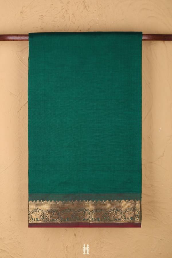 Semi Silk Cotton Saree In Emerald Green With Peacock Border