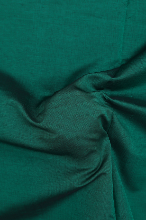 Semi Silk Cotton Saree In Emerald Green With Peacock Border