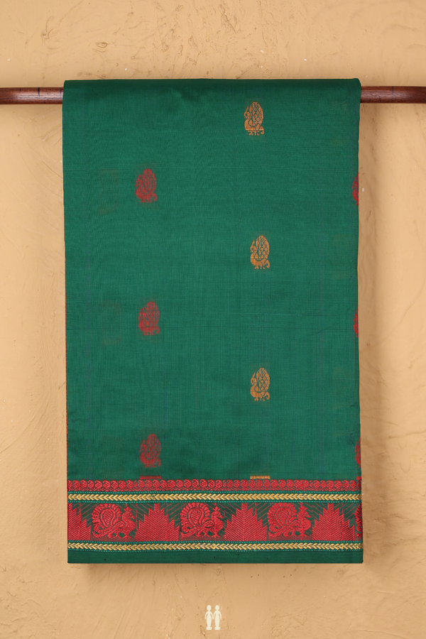 Semi Silk Cotton Saree In Green With Peacock Buttas