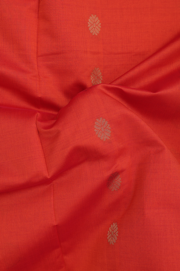 Semi Silk Cotton Saree In Bright Orange With Paisley Buttas