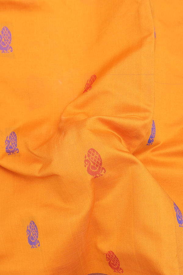 Semi Silk Cotton Saree In Orange With Peacock Buttas