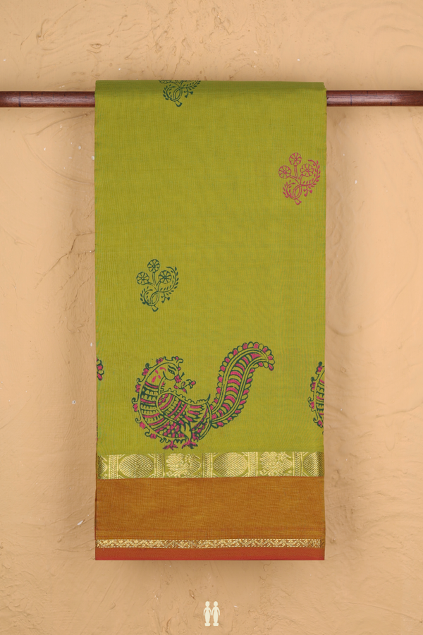 Semi Silk Cotton Saree In Pear Green With Floral Buttas