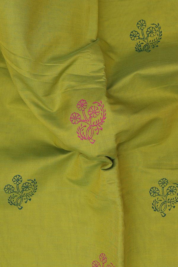 Semi Silk Cotton Saree In Pear Green With Floral Buttas
