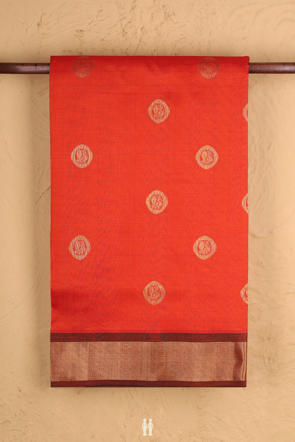 Semi Silk Cotton Saree In Spiced Orange With Peacock Buttas