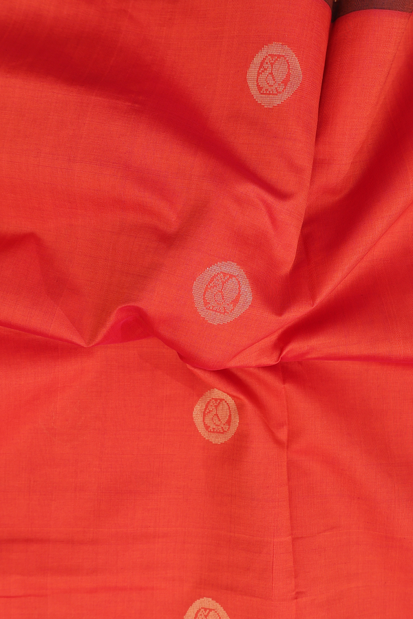 Semi Silk Cotton Saree In Spiced Orange With Peacock Buttas