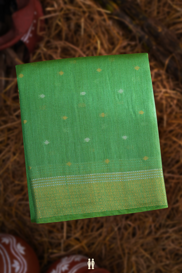 Tussar Silk Saree In Green With Zari Buttas