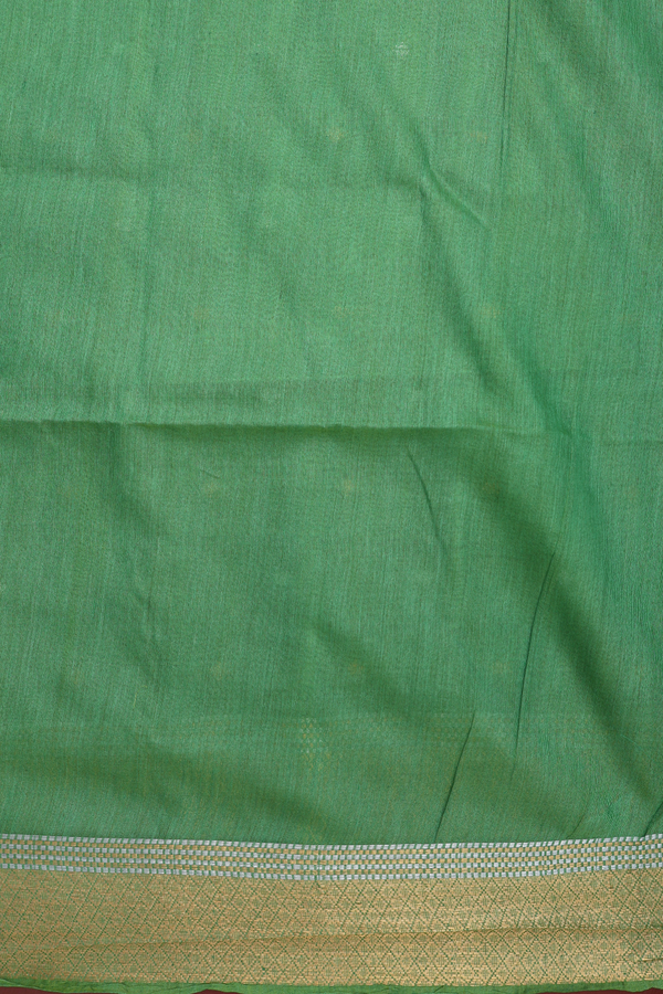Tussar Silk Saree In Green With Zari Buttas