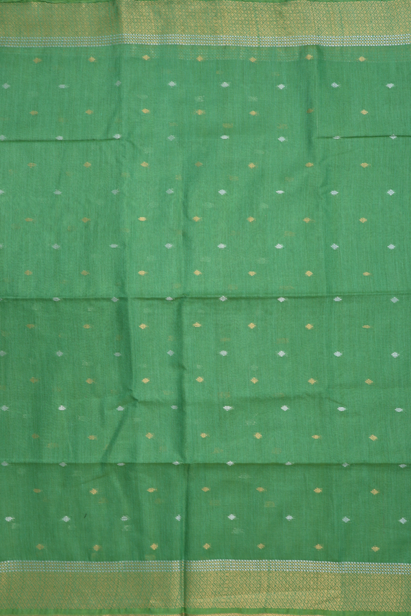 Tussar Silk Saree In Green With Zari Buttas