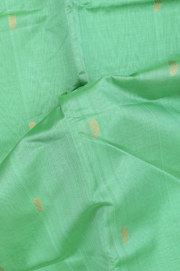 Silk Cotton Saree In Green With Paisley Buttas