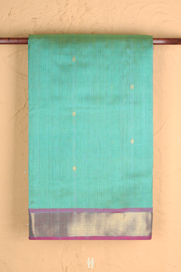 Silk Cotton Saree In Green With Zari Buttas