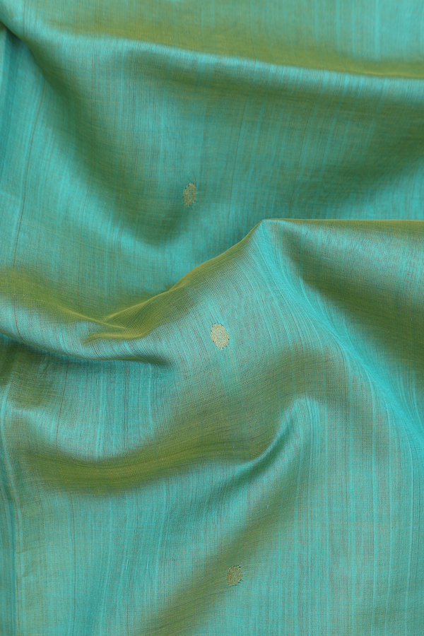 Silk Cotton Saree In Green With Zari Buttas