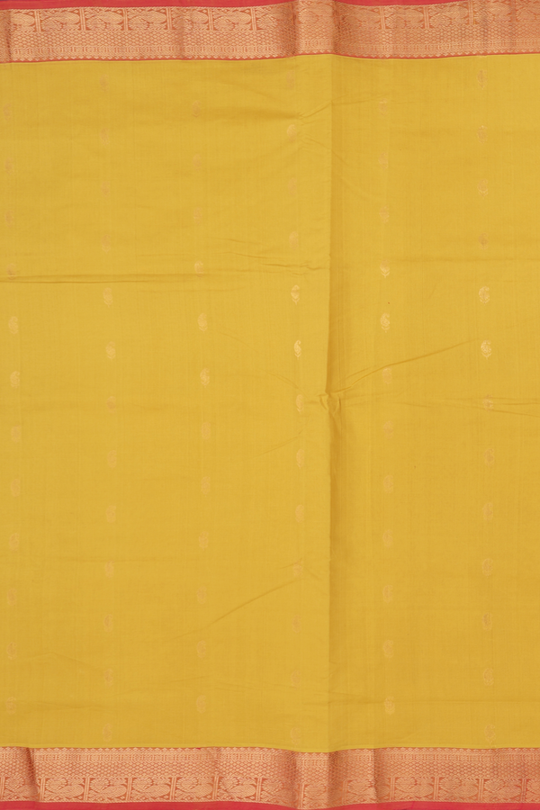 Silk Cotton Saree In Mustard Yellow With Paisley Buttas