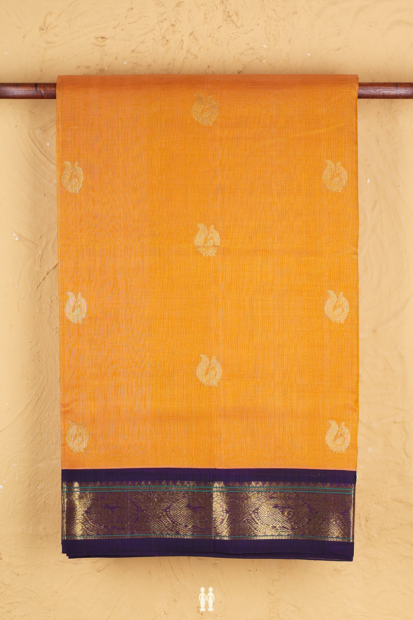 Silk Cotton Saree In Ochre Orange With Peacock Buttas
