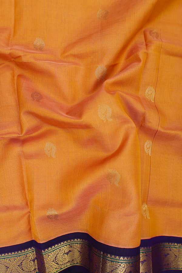 Silk Cotton Saree In Ochre Orange With Peacock Buttas