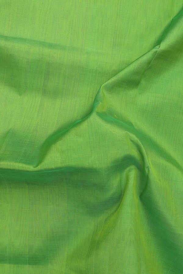 Silk Cotton Saree In Plain Green With Temple Border