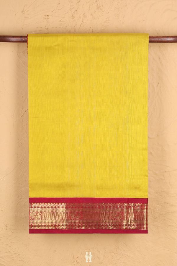 Silk Cotton Saree In Plain Yellow With Peacock Border