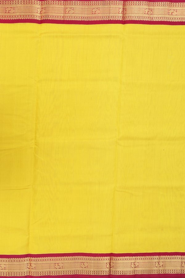 Silk Cotton Saree In Plain Yellow With Peacock Border