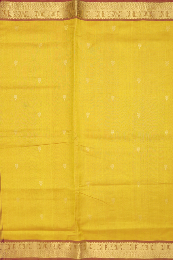 Silk Cotton Saree In Yellowish Brown With Zari Buttas