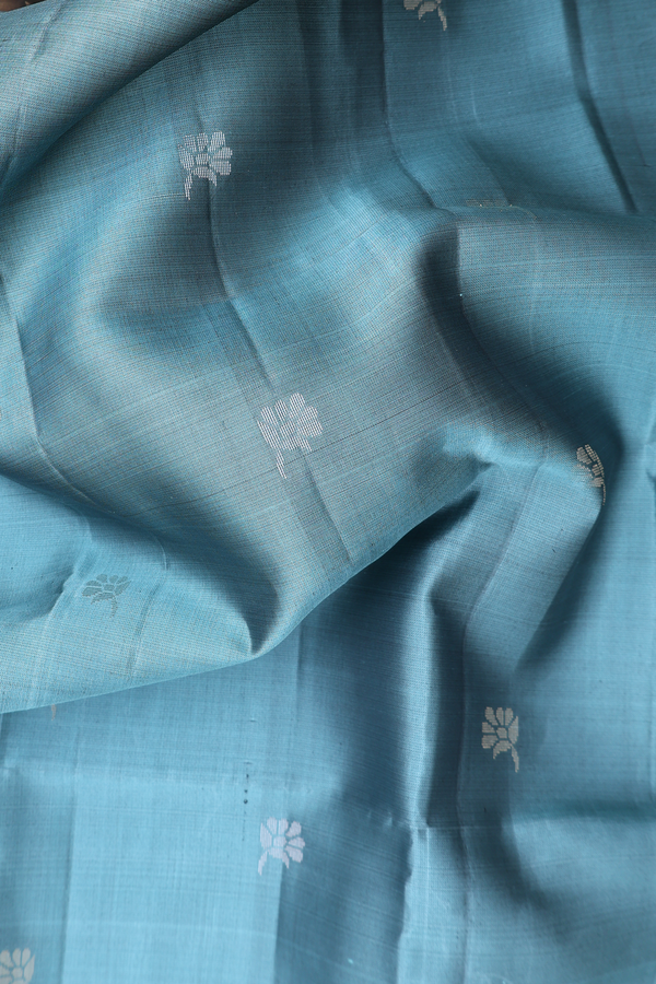 Soft Silk Saree In Aegean Blue With Floral Buttas