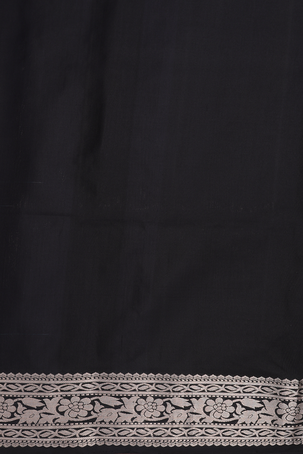 Soft Silk Saree In Black With Zari Buttas