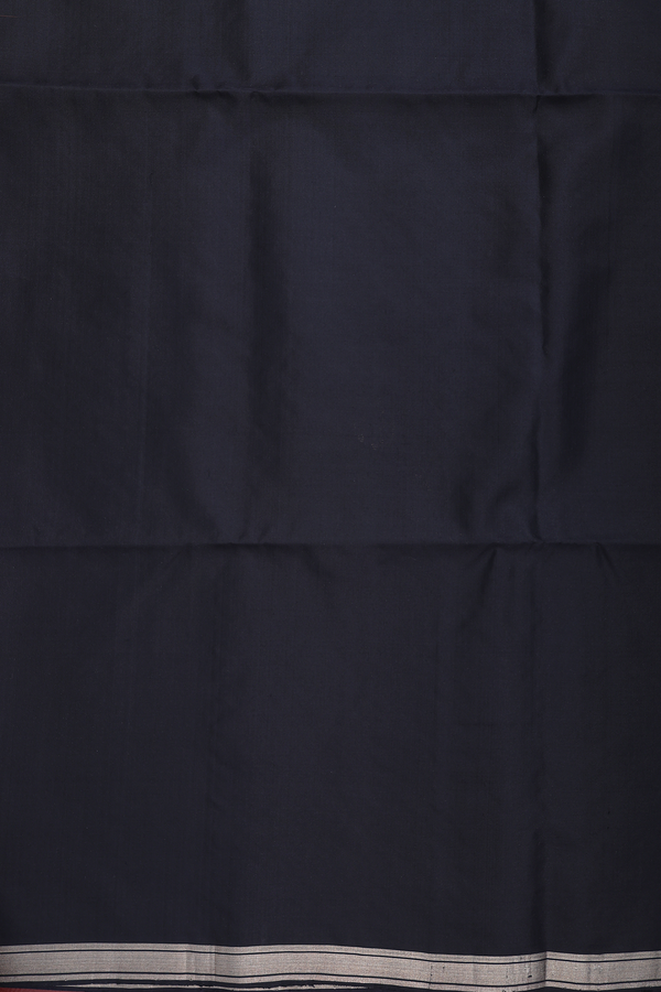 Soft Silk Saree In Black With Zari Buttas