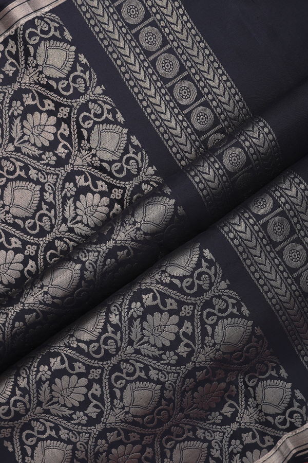 Soft Silk Saree In Black With Zari Buttas