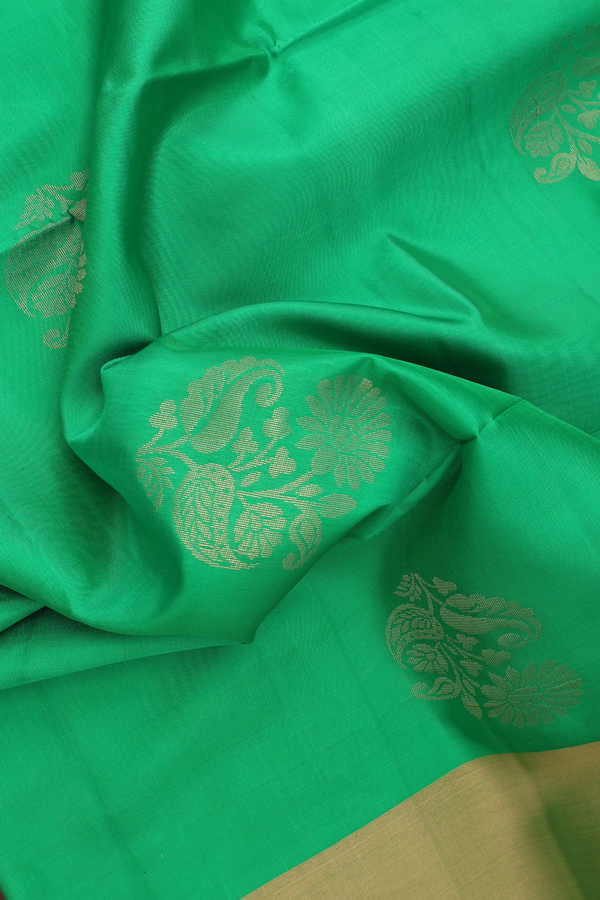 Soft Silk Saree In Bold Green With Floral Motifs