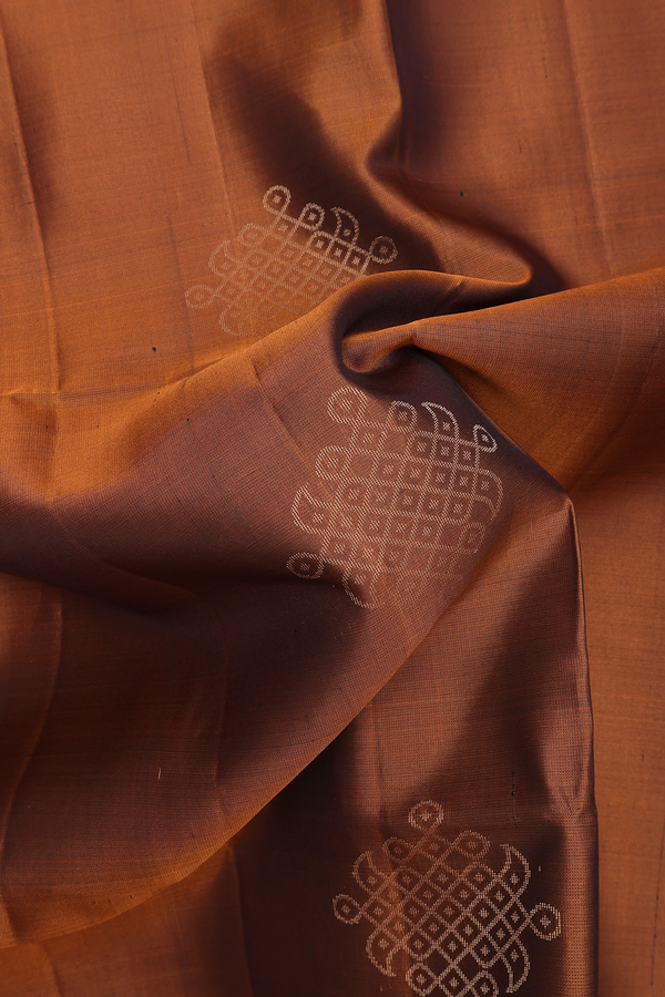 Soft Silk Saree In Brown With Kolam Buttas