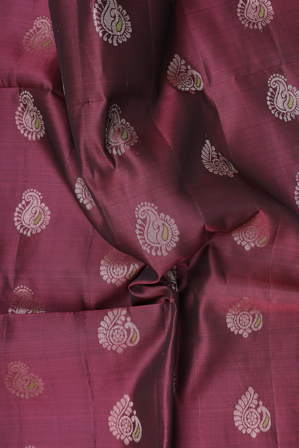 Soft Silk Saree In Brownish Purple With Paisley Buttas