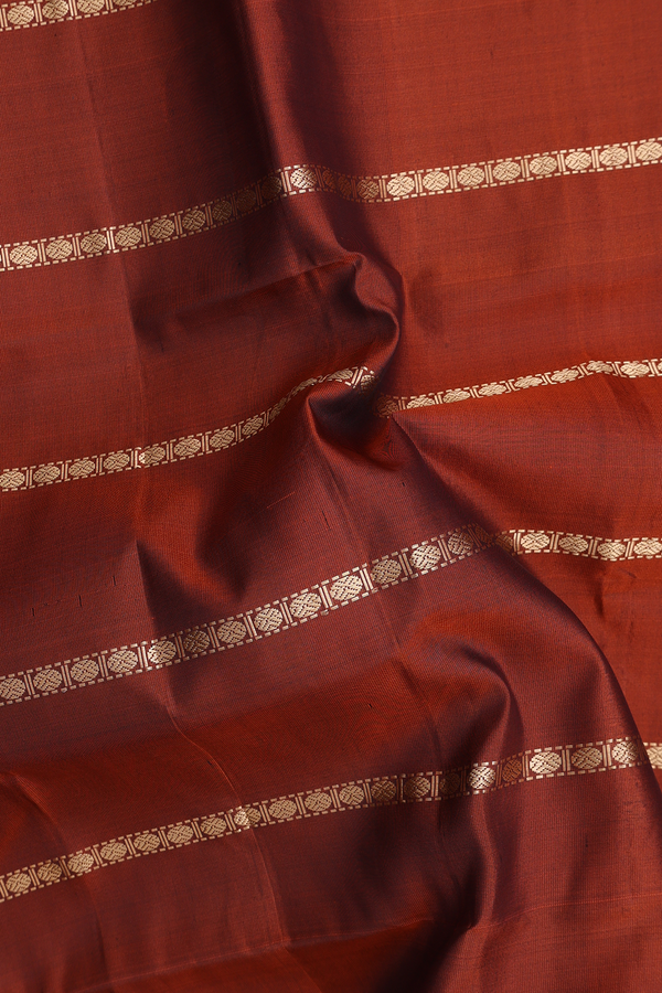 Soft Silk Saree In Copper Orange With Stripes Design