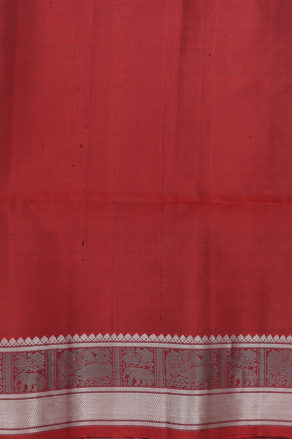 Soft Silk Saree In Rust Red With Zari Buttas