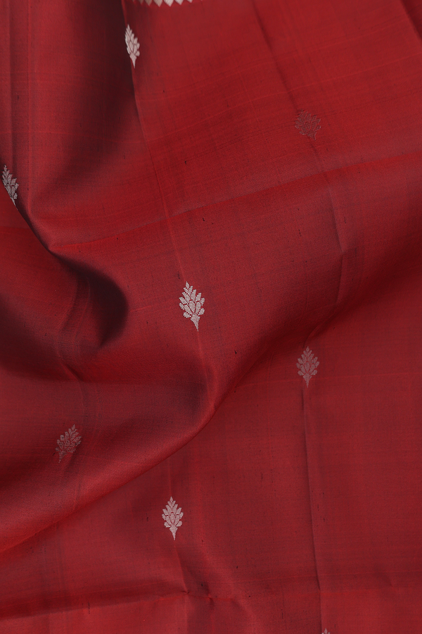 Soft Silk Saree In Rust Red With Zari Buttas