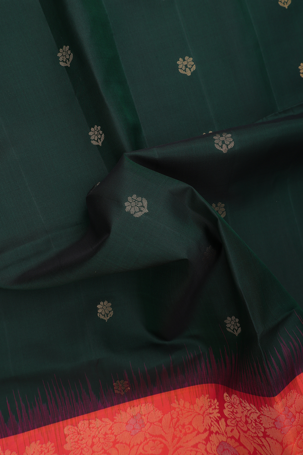 Soft Silk Saree In Dark Green With Floral Buttas