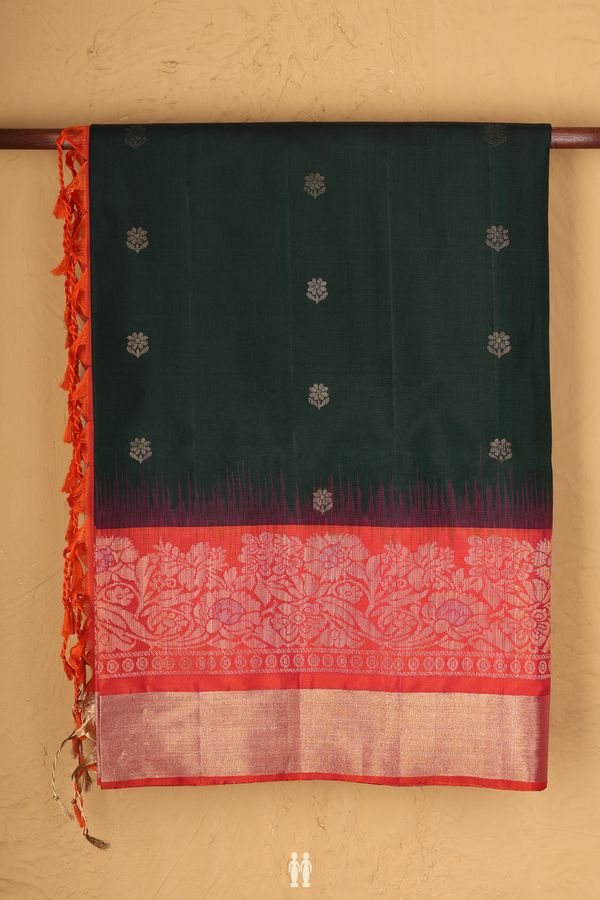 Soft Silk Saree In Dark Green With Floral Buttas