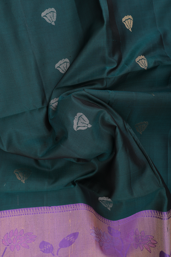 Soft Silk Saree In Dark Green With Zari Buttas