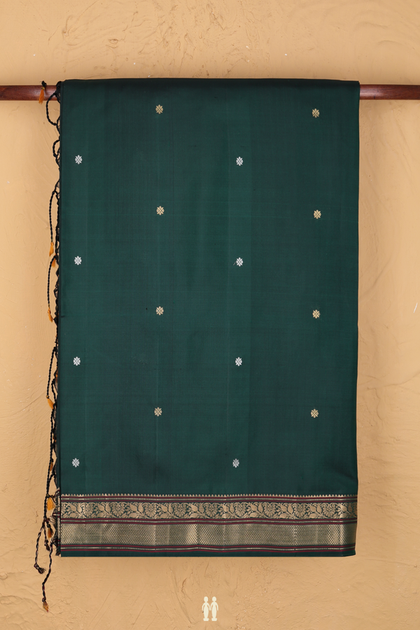 Soft Silk Saree In Dark Green With Zari Buttis