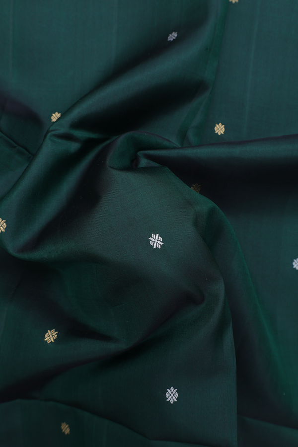 Soft Silk Saree In Dark Green With Zari Buttis