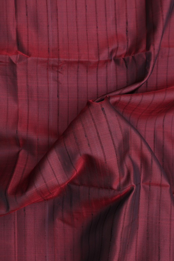 Soft Silk Saree In Dark Maroon With Self Stripes Design