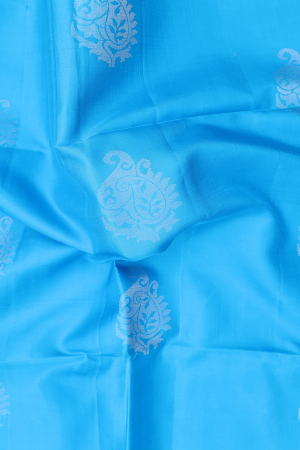 Soft Silk Saree In Deep Sky Blue With Zari Buttas