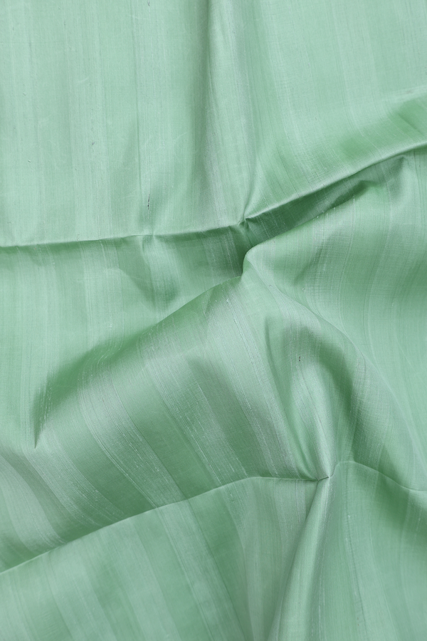 Soft Silk Saree In Plain Dusty Green With Zari Border