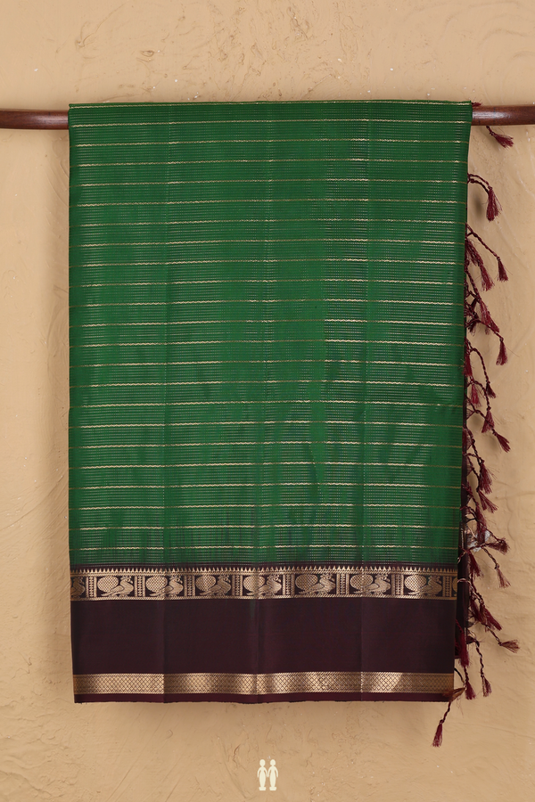 Soft Silk Saree In Emerald Green With Neli Design