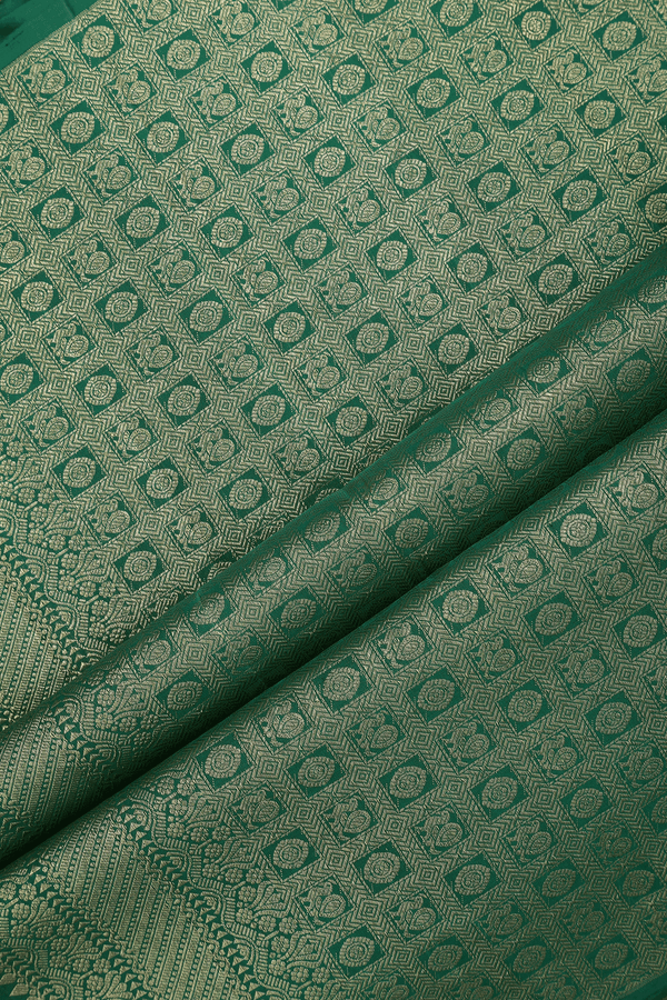 Soft Silk Saree In Emerald Green With Temple Border