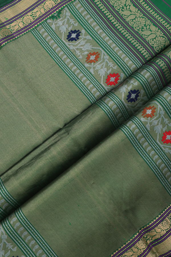 Soft Silk Saree In Emerald Green With Zari Buttas