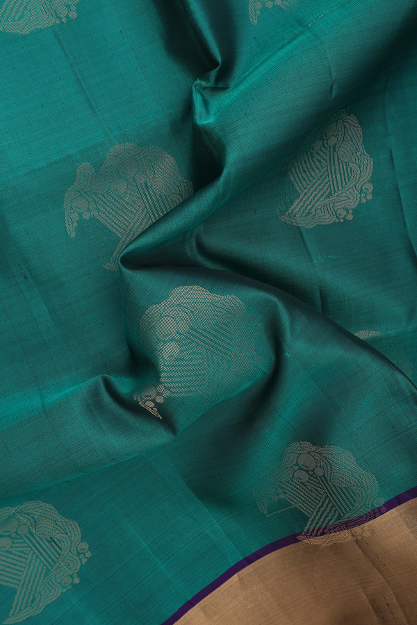 Soft Silk Saree In Emerald Green With Zari Motifs