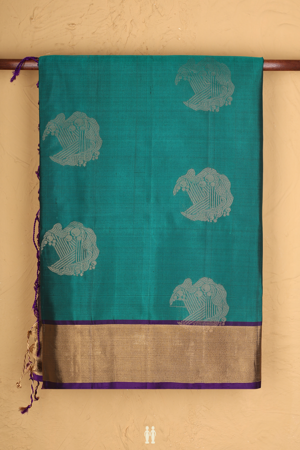 Soft Silk Saree In Emerald Green With Zari Motifs
