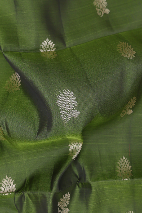 Soft Silk Saree In Fern Green With Floral Buttas