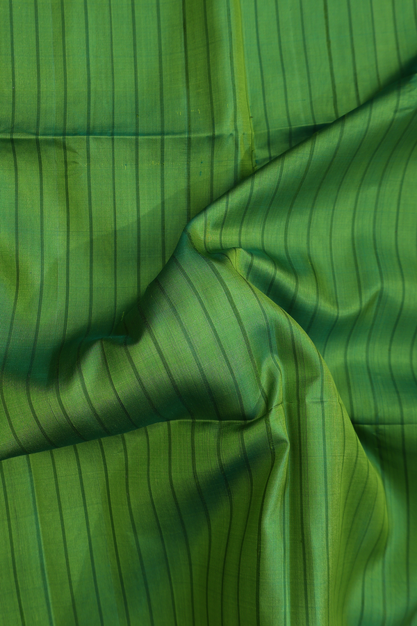 Soft Silk Saree In Parrot Green With Self Stripes Design