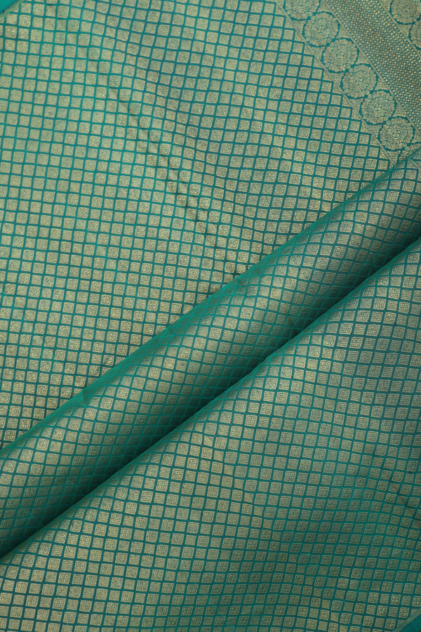 Soft Silk Saree In Forest Green With Temple Border