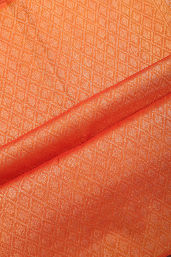 Soft Silk Saree In Ginger Orange With Zari Buttas
